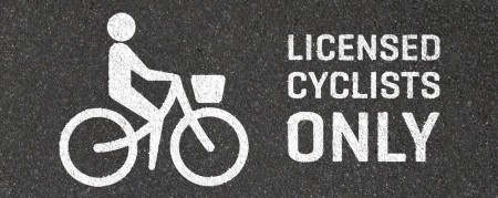 "Licensed Cyclists Only"