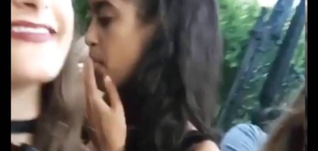Malia Obama smokes what appears to be a cannabis joint while at Lollapalooza